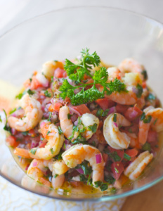 Ceviche de Camarón Ceviche de Camarón con chiles serranos, cebolla morada, ajo, limon, cilantro y especias