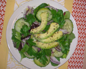 Green Salad Green Salad with field greens, avocados, cucumbers, green pepers and red onion