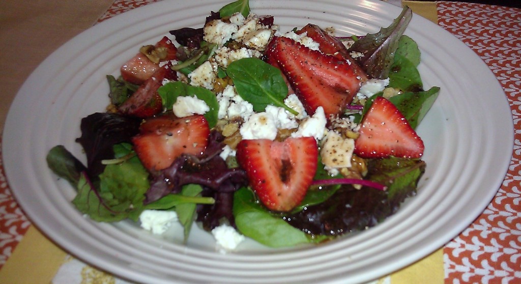 Strawberry Salad with raspberry dressing, feta cheese and walnuts