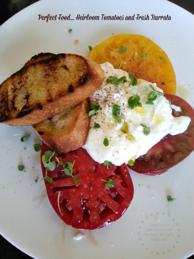 Heirloom tomatoes from the region topped with house made burrata #TASTE14