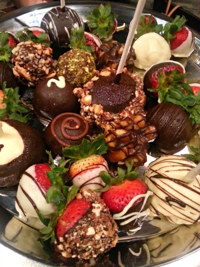 Delicious assortment of handmade chocolates and chocolate covered strawberries at Coopers Hawk #CHWinery