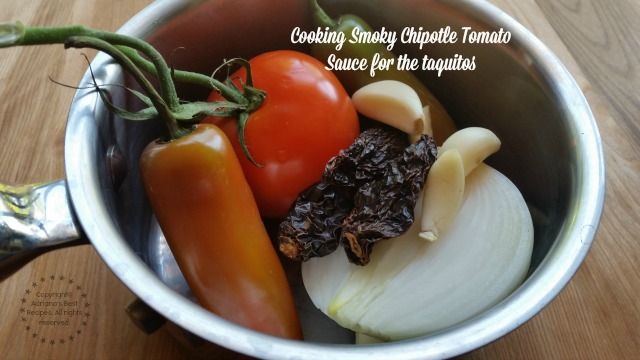 Cooking Smoky Chipotle Tomato Sauce for the taquitos  #ABRecipes