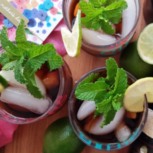 Cuba Libre, a Cuban cocktail with rum, lime, and mint