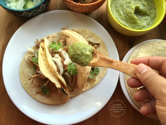Garnish the tacos with spicy serrano guacamole sauce #Porknostico #ad