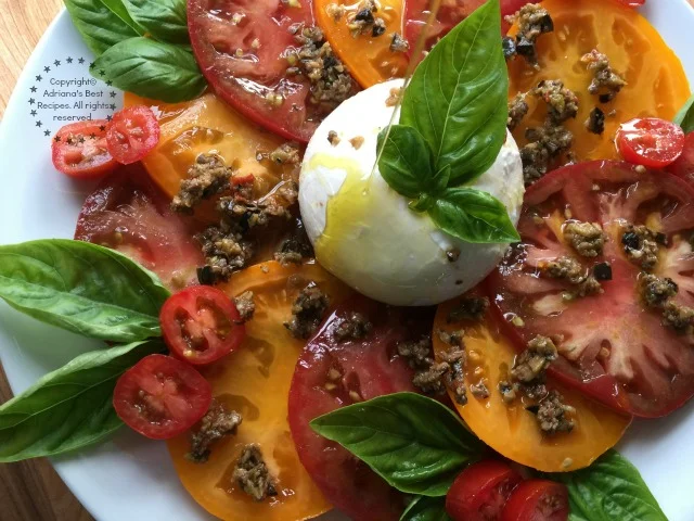 Drizzle the salad with olive oil season with tapenade and black pepper Drizzle the salad with olive oil season with tapenade and black pepper