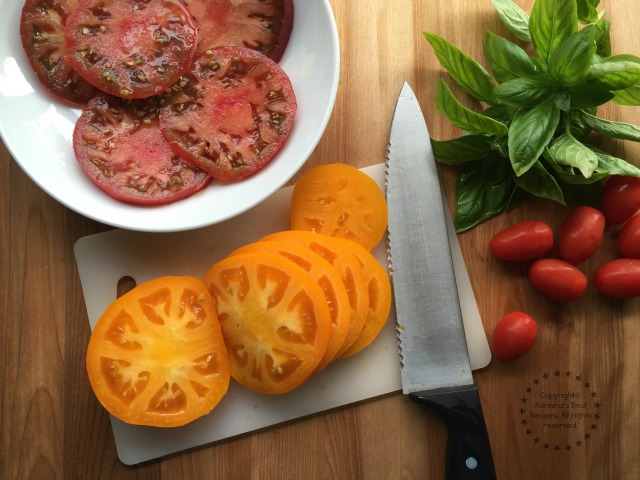 Slicing the tomatoes for the Heirloom Tomato and Burrata Salad