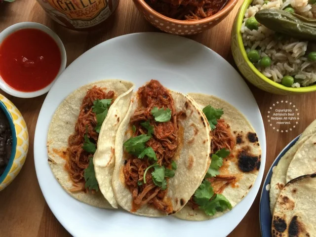 The shredded pork on red chile sauce can be cooked on the slow cooker but for this I used my pressure cooker