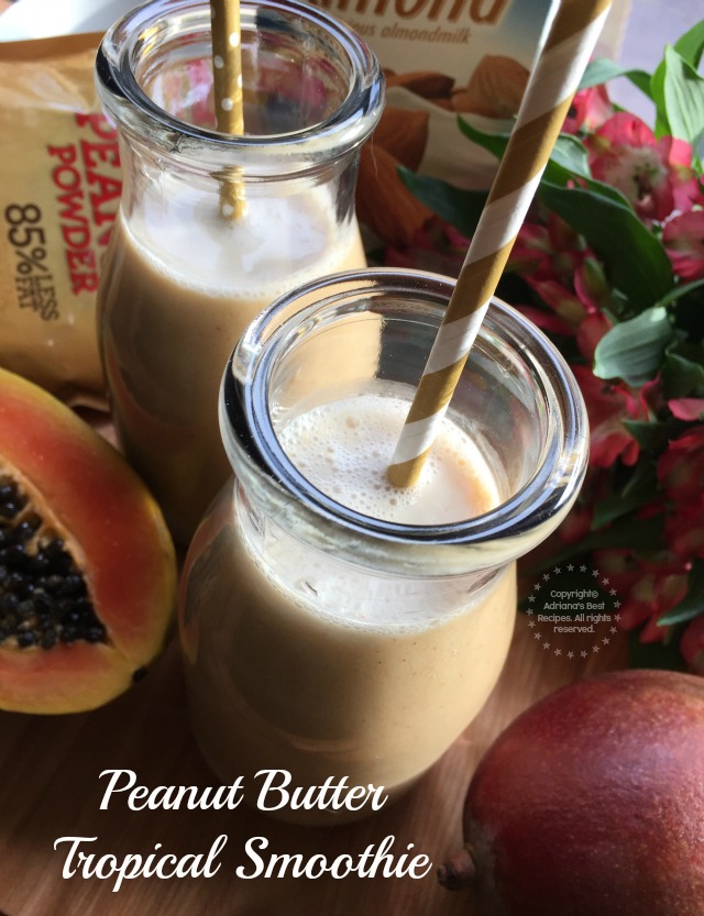 This peanut butter tropical smoothie has papaya pineapple mango unsweetened Silk Almond milk and Jif Peanut Powder
