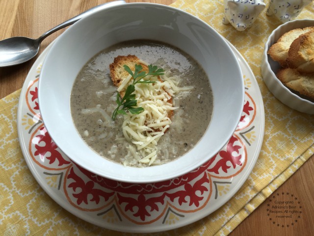 Mushroom Cream Soup served with cheese and crostini