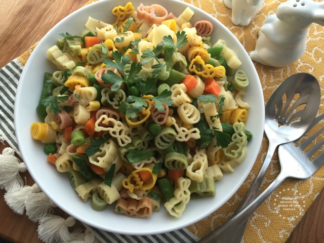 The spring pasta goes perfect with parmesan cheese too