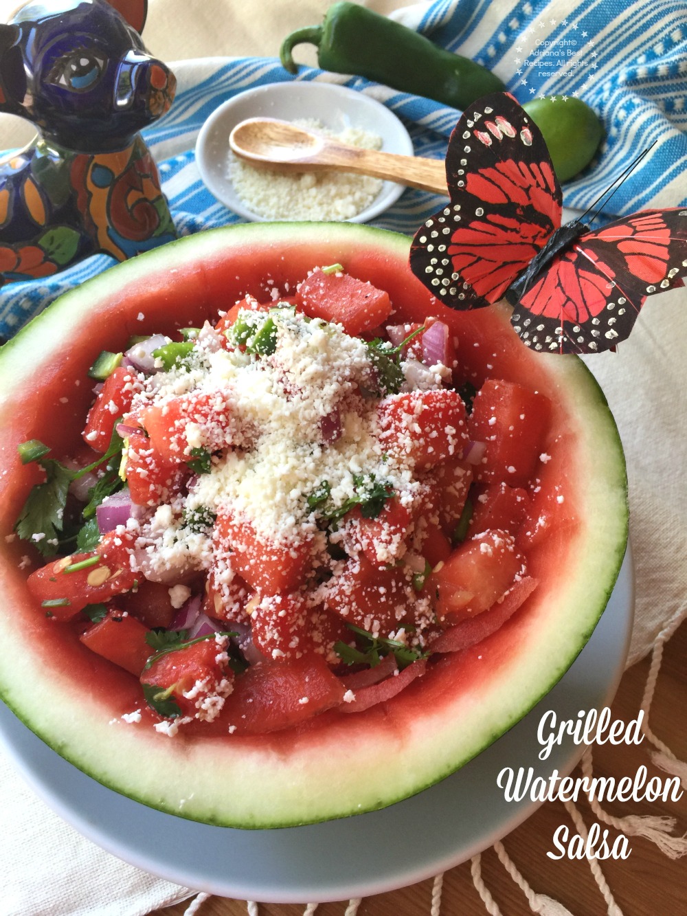 Grilled watermelon salsa made with jalapeño peppers, purple onions, cilantro, lime juice and finished with grated cotija cheese