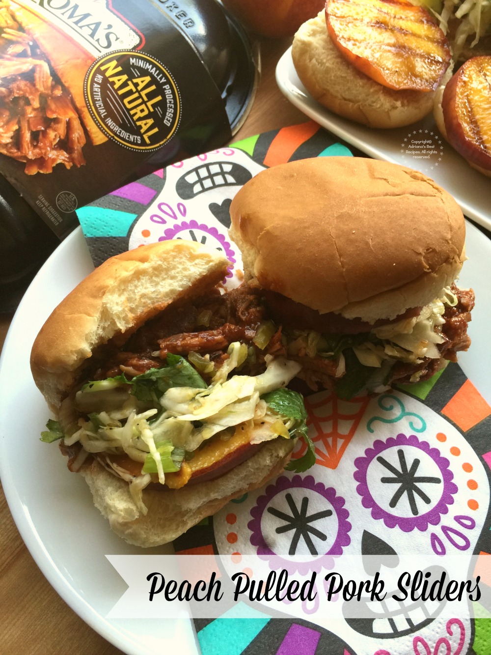 Juicy and tender Peach Pulled Pork Sliders made with seasonal fresh peaches, a citrus spicy slaw and Tony Romas Tender Juicy Pulled Pork Kansas City Sweet Hickory