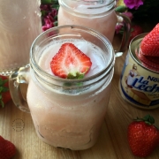 Easy strawberry horchata agua fresca made with fresh strawberries. almond extract and NESTLE La Lechera Sweetened Condensed Milk