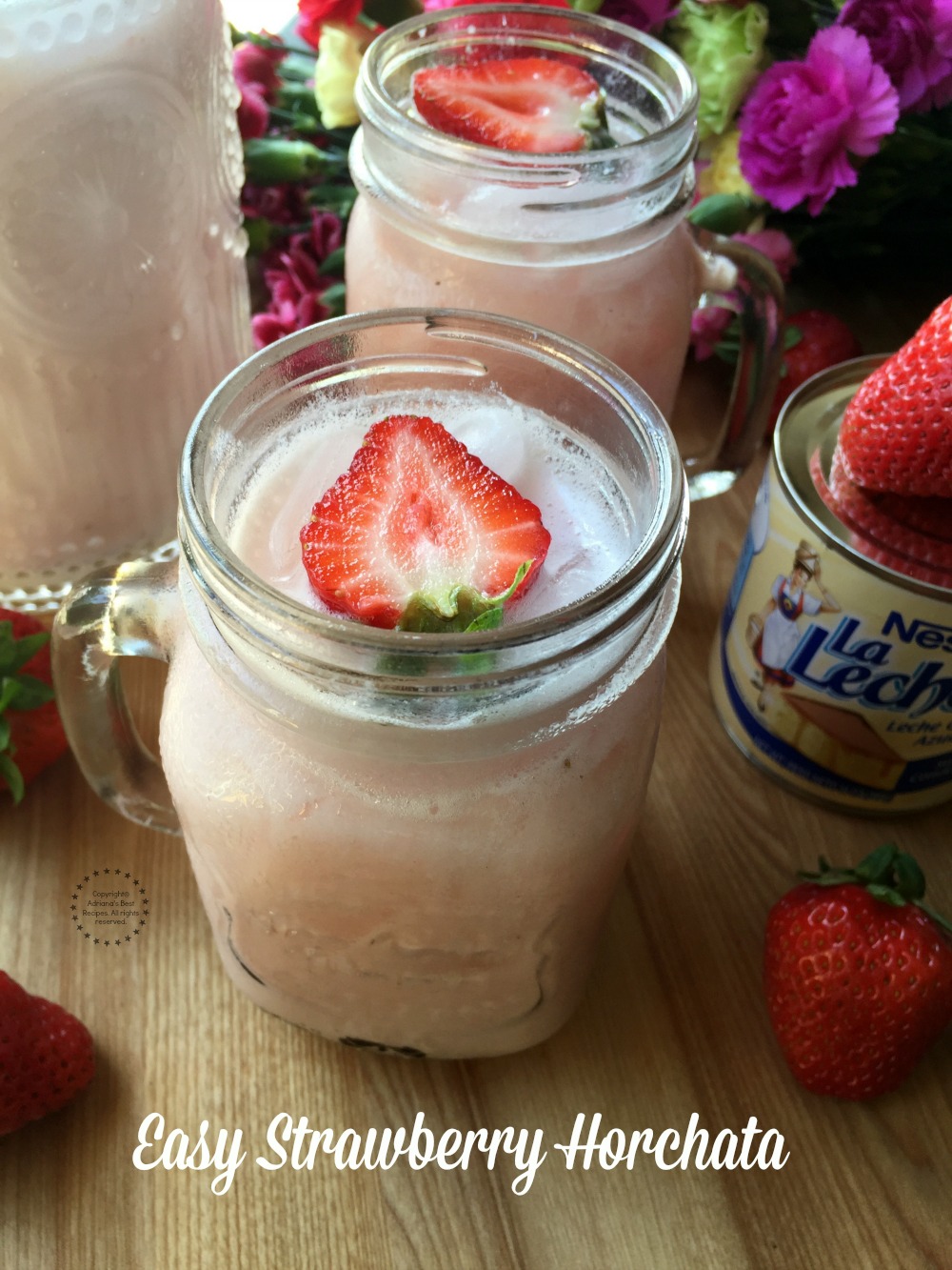 Easy strawberry horchata agua fresca made with fresh strawberries. almond extract and NESTLE La Lechera Sweetened Condensed Milk 