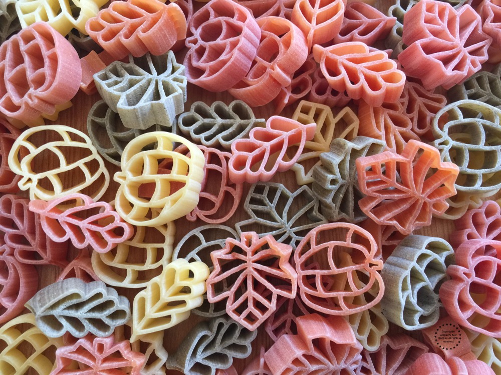 This is a durum pasta made with vegetables and cut with fall leaves and pumpkin shapes