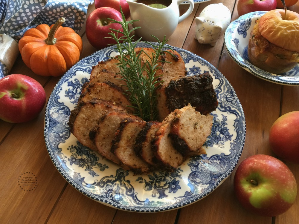 This Chipotle Apple Beer Pork Loin is being paired with oven baked corn stuffing apples