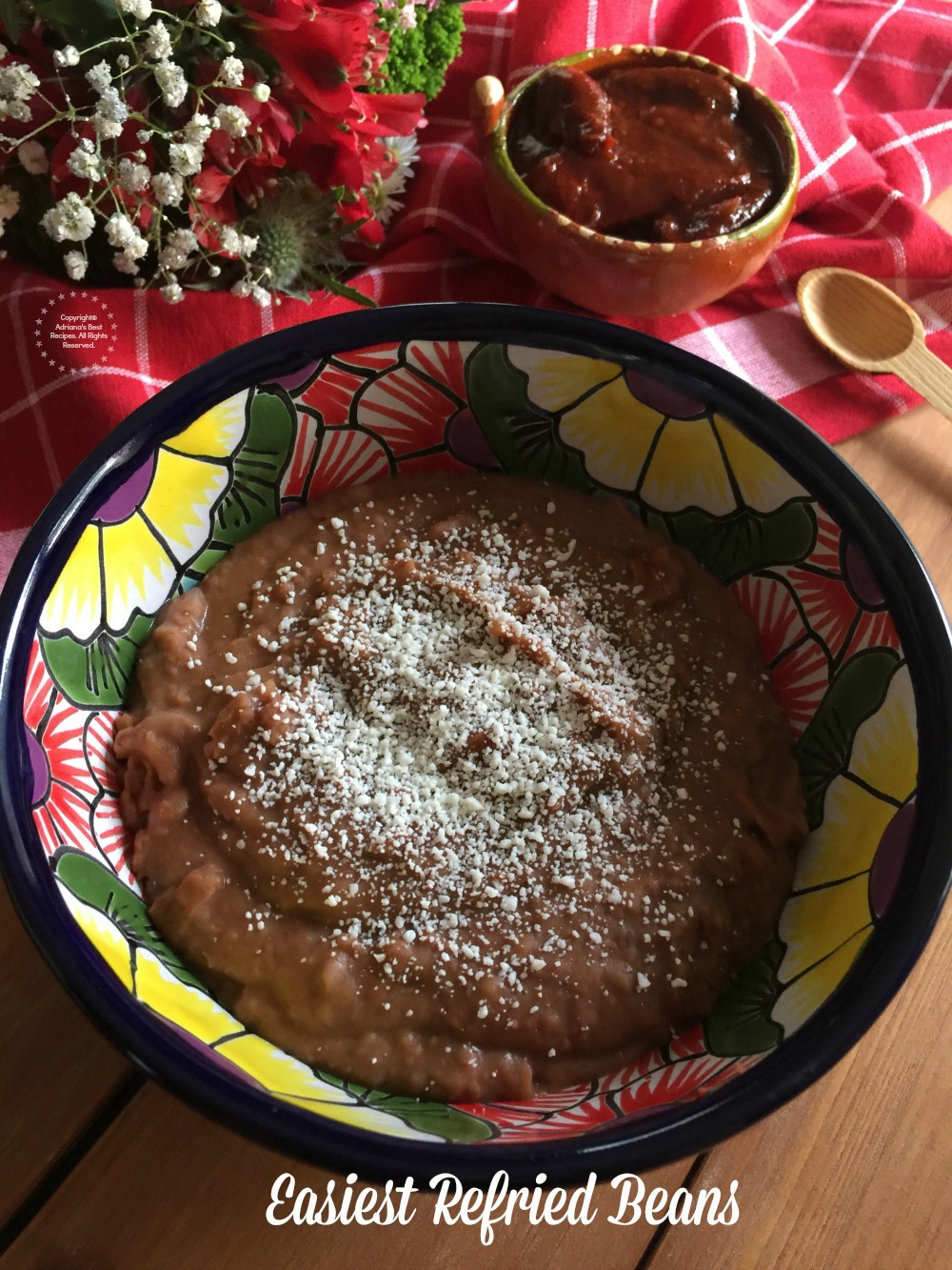 When you are hosting a party like a Posada you need to have the easiest refried beans recipe. Because who can eat Mexican food without refried beans.
