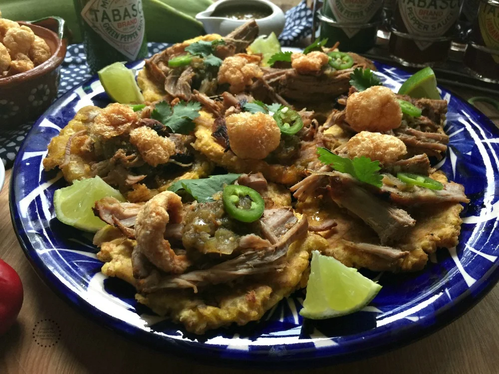 The tostones with carnitas are the perfect appetizer for a holiday party