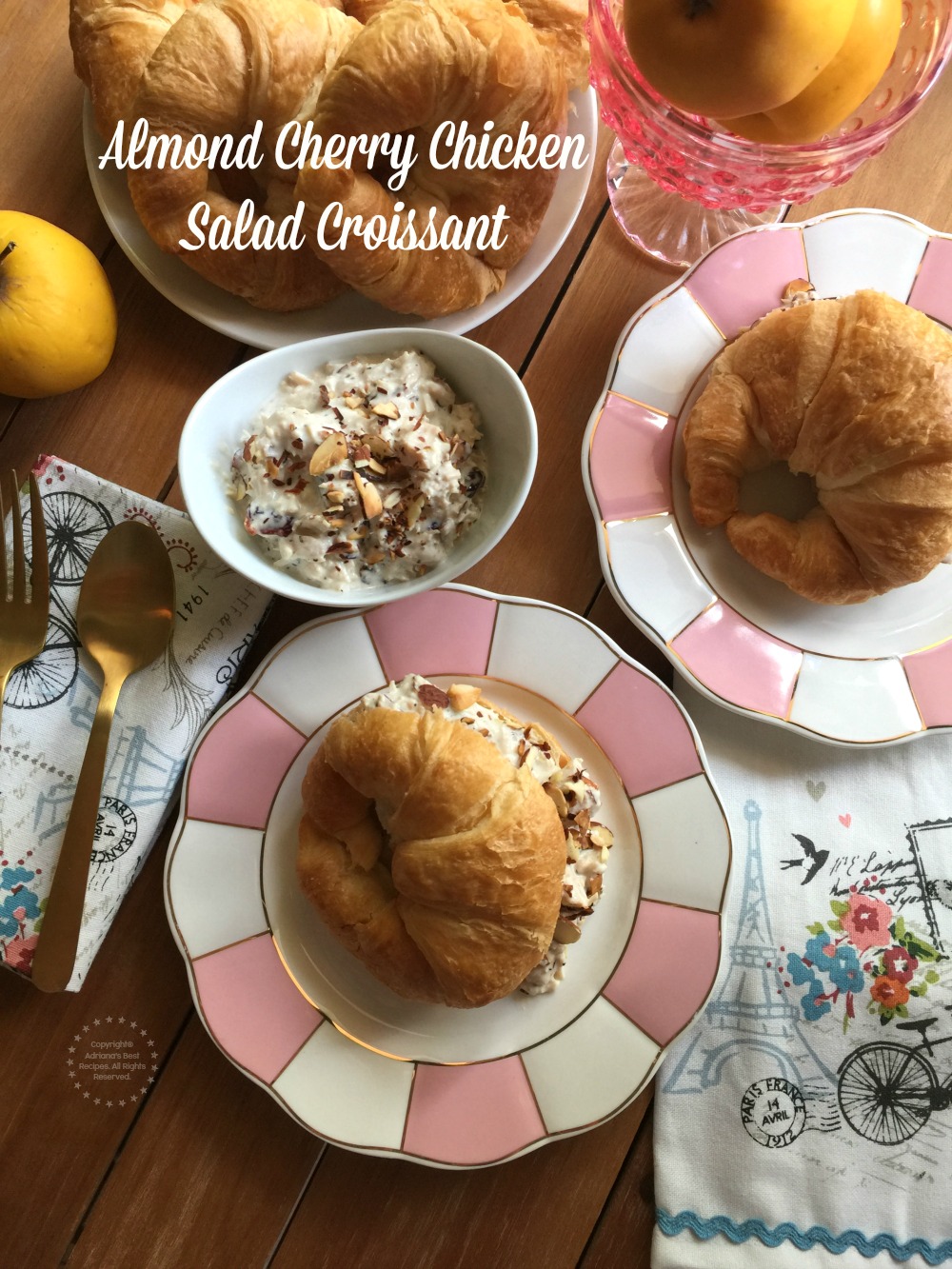 A delightful almond cherry chicken salad croissant made with canned chicken white meat, dried cherries, toasted almonds, honey, sour cream, mayo and spices