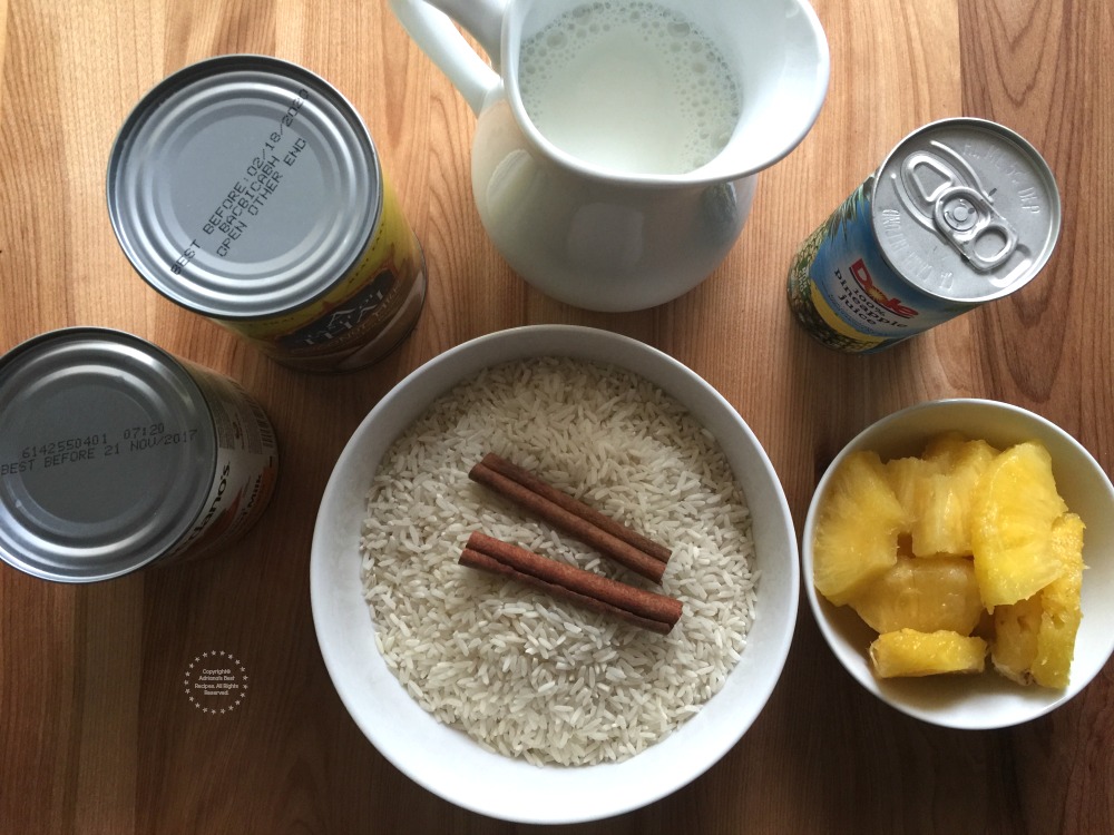 ingredients for making arroz con leche include condensed milk, long grain rice, cinnamon