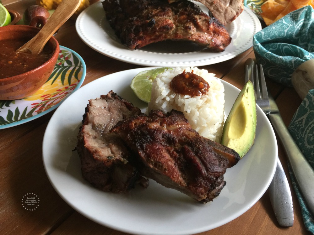 Pairing the pork ribs with white rice, beans, avocado and spicy homemade salsa