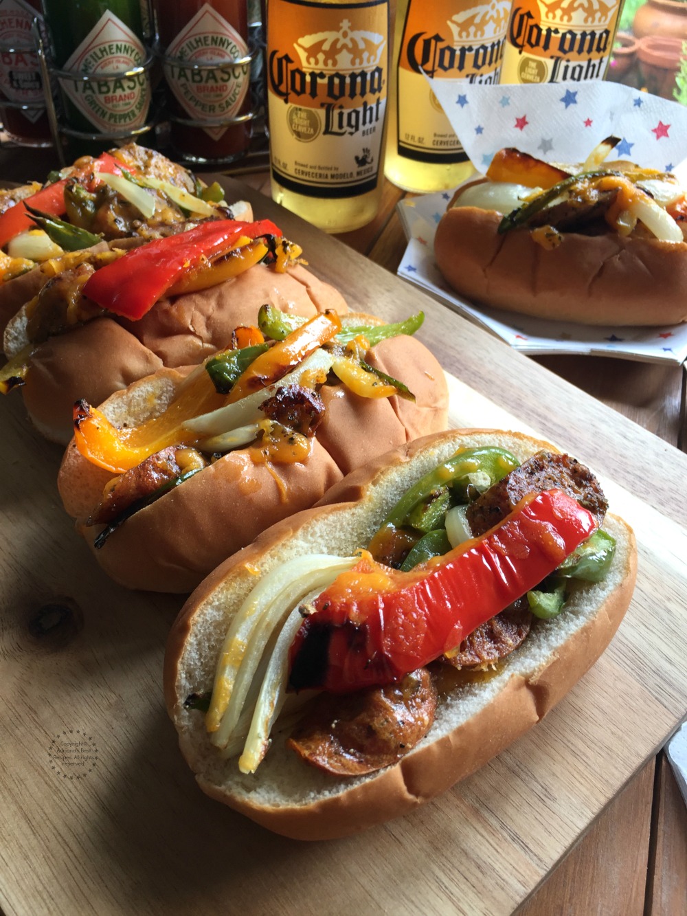 A tray with hot dogs and beer