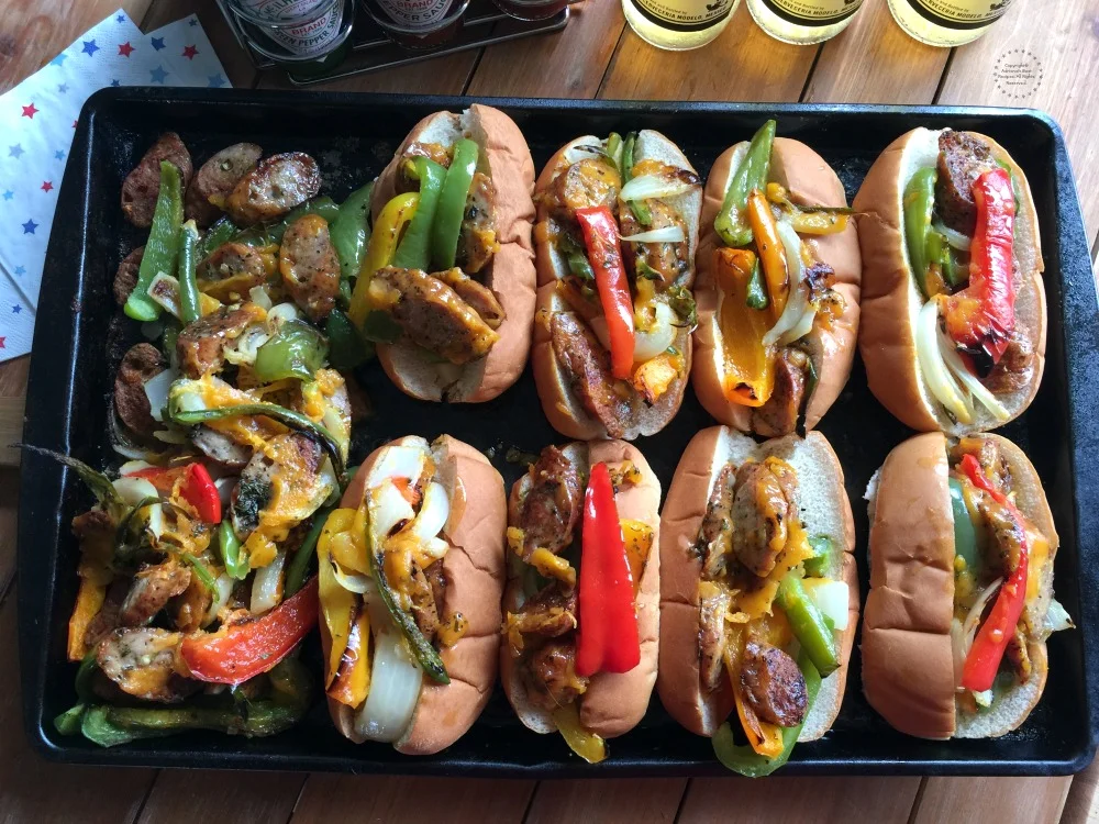 A tray with cheesy chicken sausage and buns.