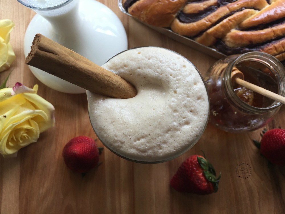 Garnishing with a cinnamon stick to add flavor and to offer a better presentation