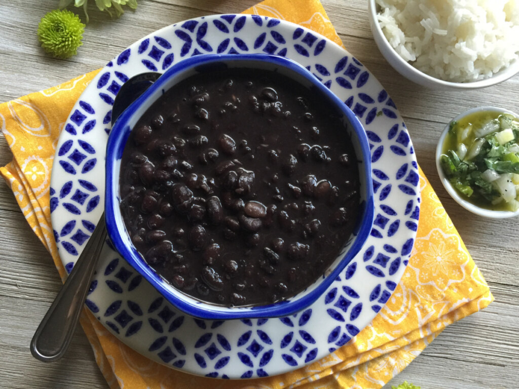 a bowl with cuban black beans with green pepper