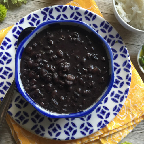 a bowl with cuban black beans with green pepper
