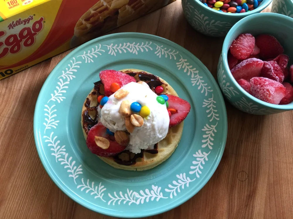 a plate with waffles and ice cream