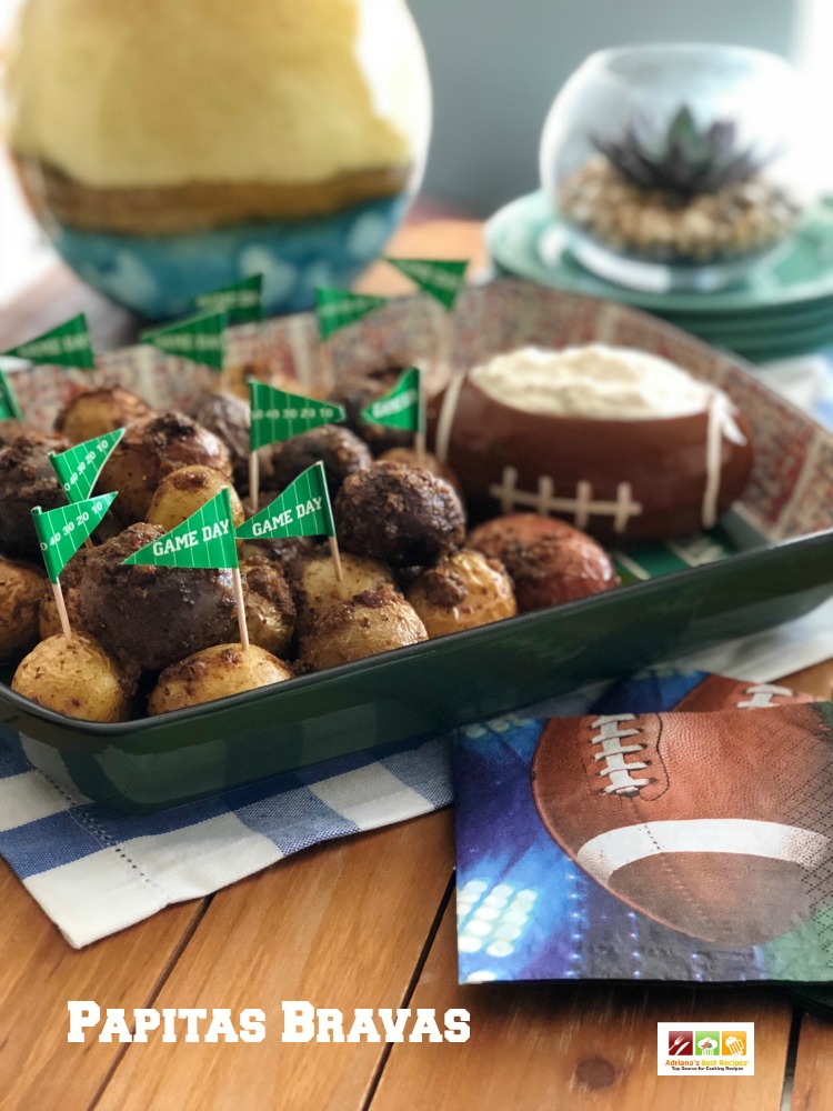 Papitas Bravas hechas con papas moradas, blancas y rojas