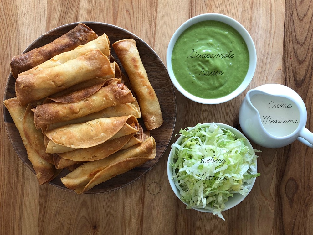 Ready to serve the crispy chicken taquitos