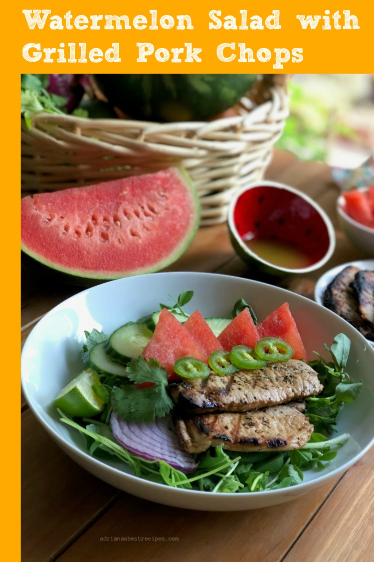Extremely flavorful watermelon salad with grilled pork chops for your weekly summer menu. Made with grilled boneless pork chops, sweet pea greens, watermelon, cucumber, jalapeño, purple onion and cilantro. Dressed with a simple olive oil and lime juice dressing. #PorkEsSabor #AD