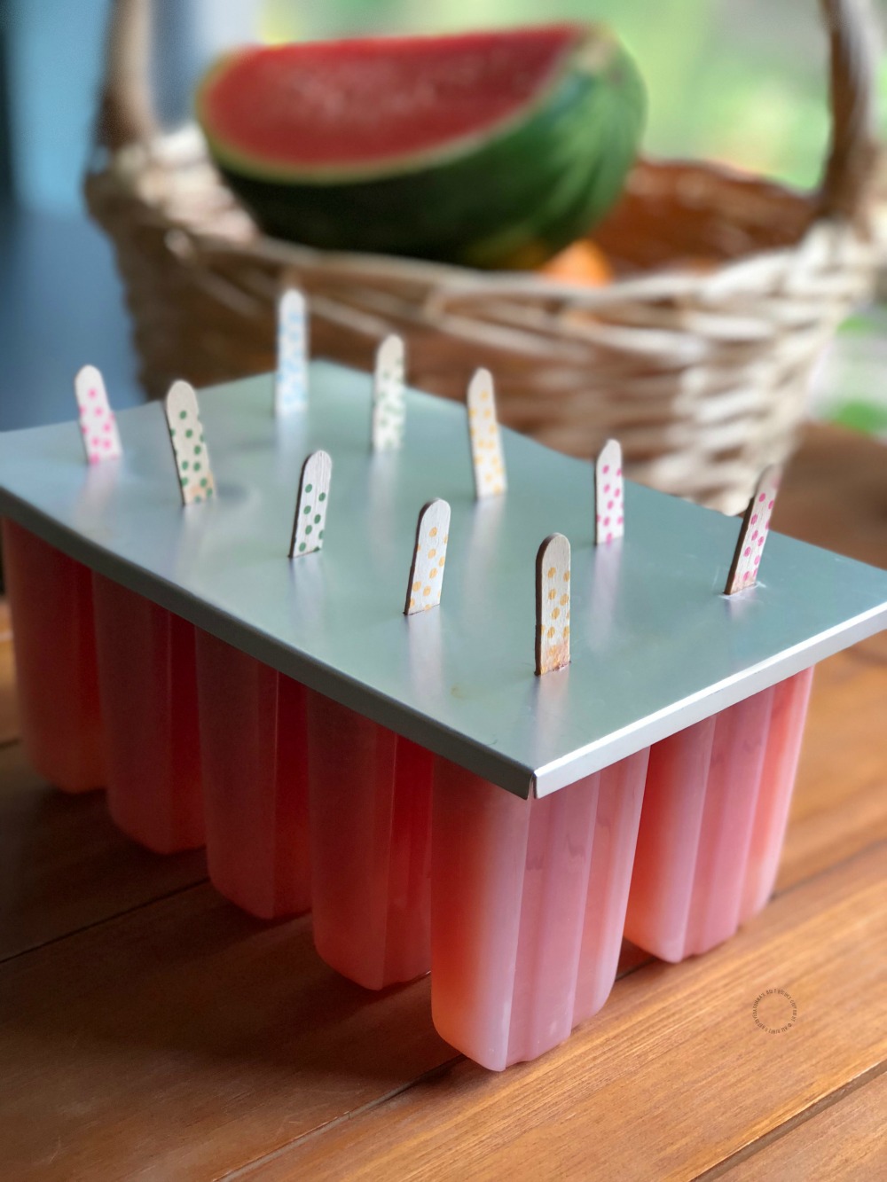 Freeze the watermelon lemonade ice pops overnight