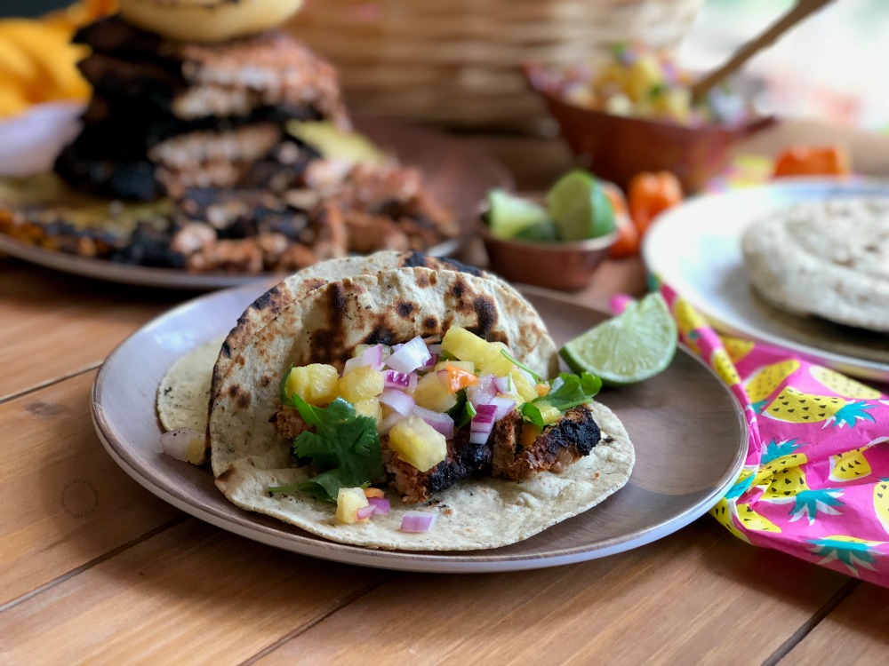 Indulging on exquisite pork tacos al pastor