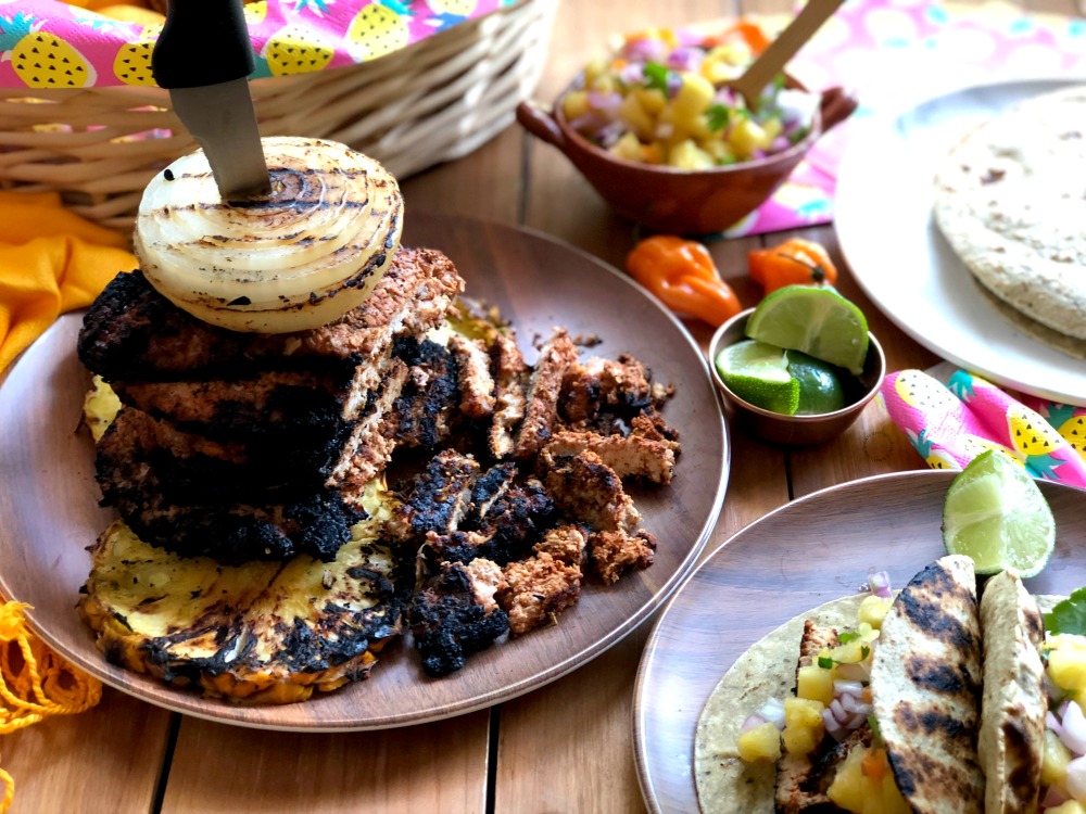 Stack the grilled pork loin steaks for a traditional al pastor experience