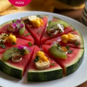 Fresh watermelon pizza using yummy toppings and cream cheese