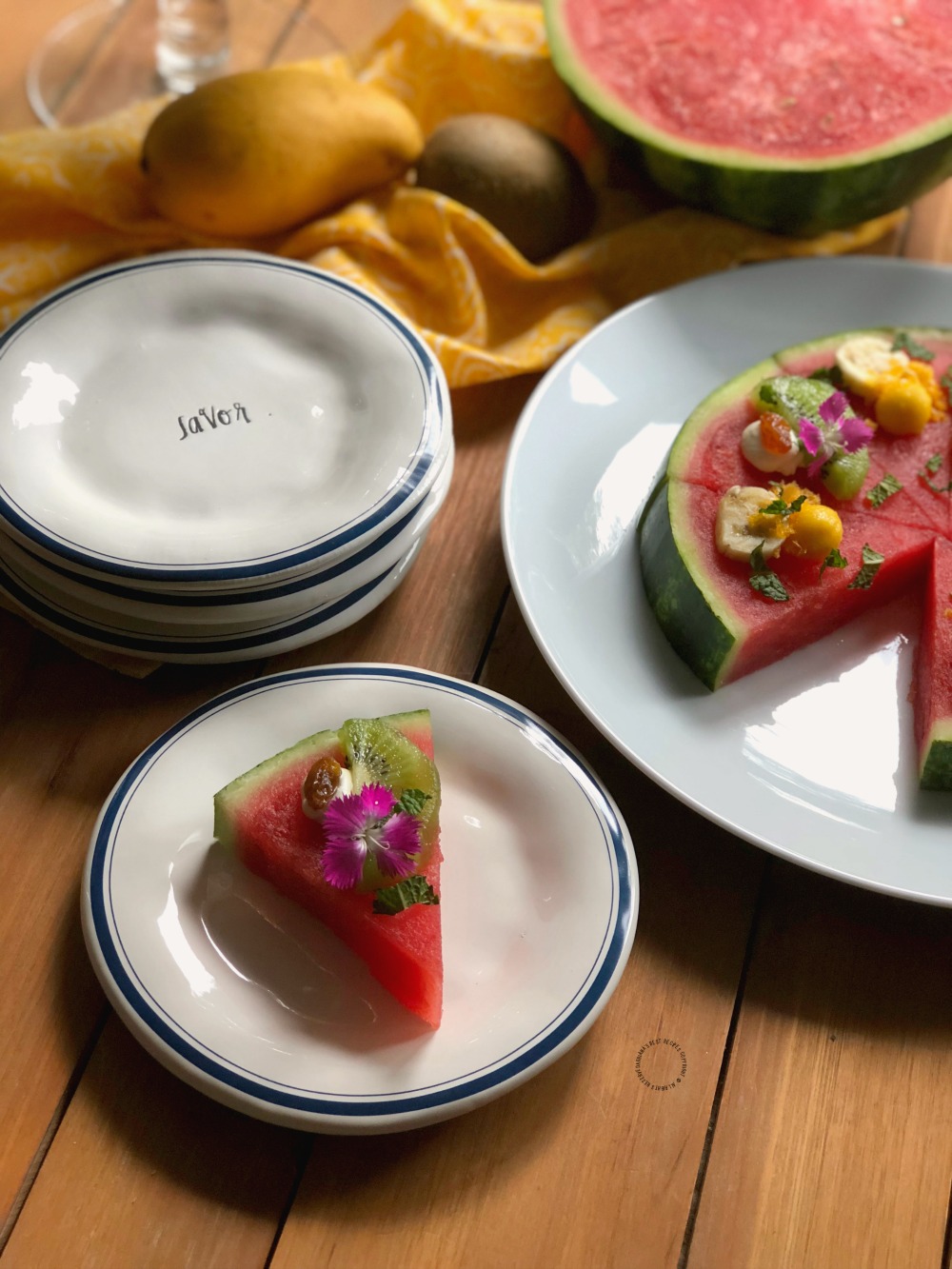 Savor a slice of fresh watermelon pizza as a snack