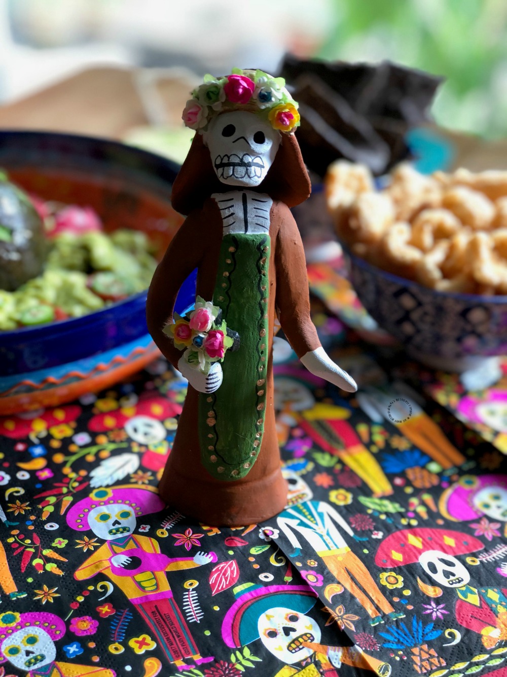 a catrina clay figurine