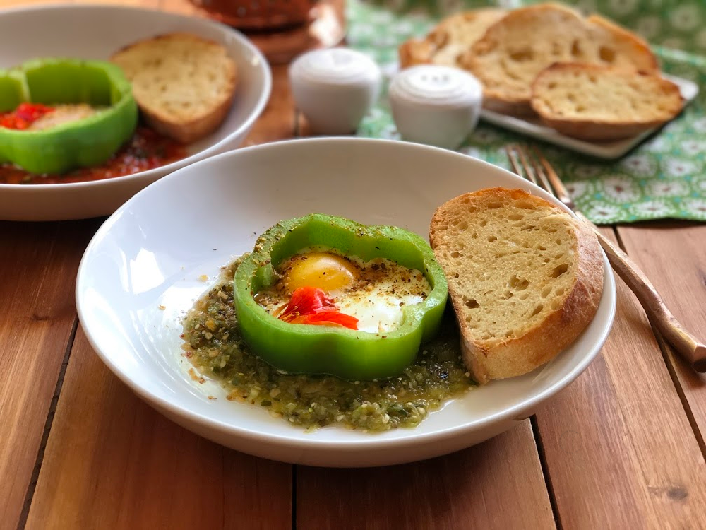 Bell Pepper Egg Breakfast Recipe made with bell peppers rounds cut simulating a flower, eggs and served with a salsa verde or red Mexican salsa. Paired with buttered toast.