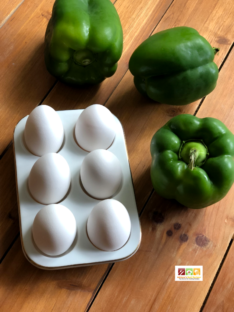 The recipe ingredients are green Florida bell peppers and fresh farm eggs. 