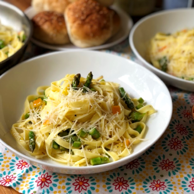 This recipe for the homestyle fettuccine has asparagus, garlic, preserved lemons, and freshly shredded Parmesan cheese.