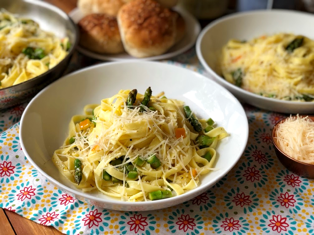 This recipe for the homestyle fettuccine has asparagus, garlic, preserved lemons, and freshly shredded Parmesan cheese.