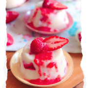 Making a Mexican classic jello with berries and milk.