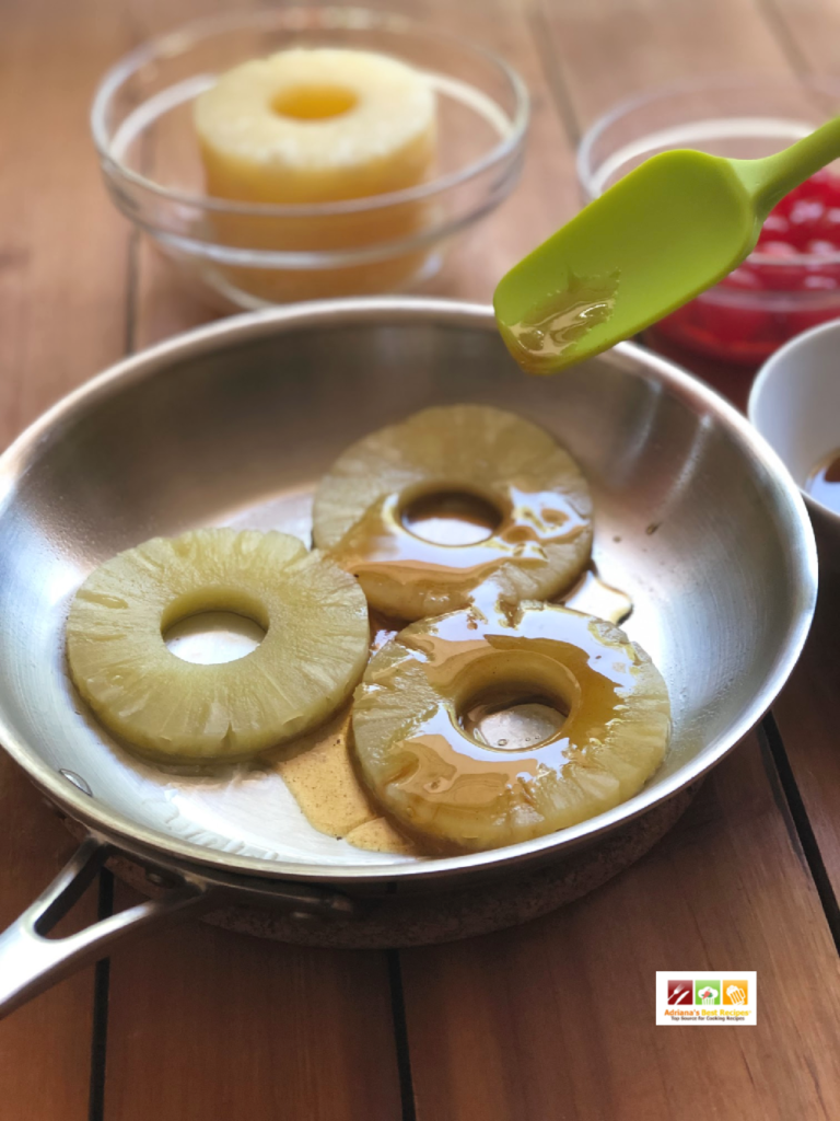 Sautéing the pineapple to add an amber color and adding some of the honey glaze for a better presentation