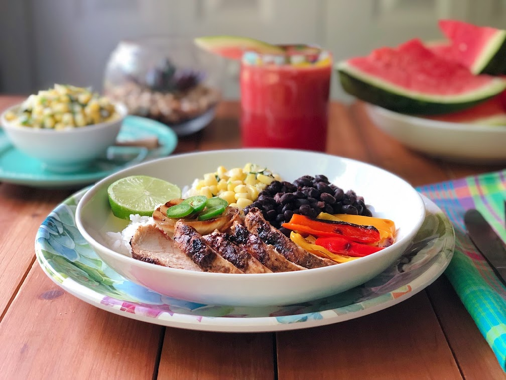 The food for our Mexican fiesta Florida style includes a grilled chicken bowl, sweet corn salsa, watermelon juice, and blueberry cupcakes