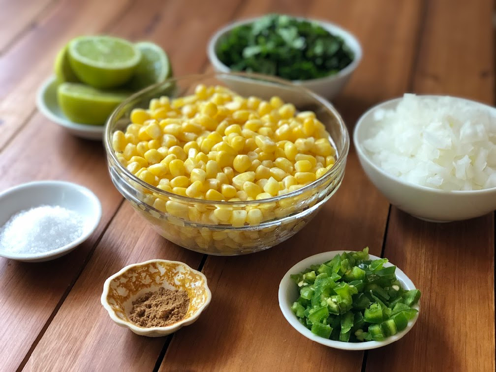 The ingredients for making the salsa include sweet corn, jalapeño peppers, white onion, cilantro, lime juice, cumin, and salt. 