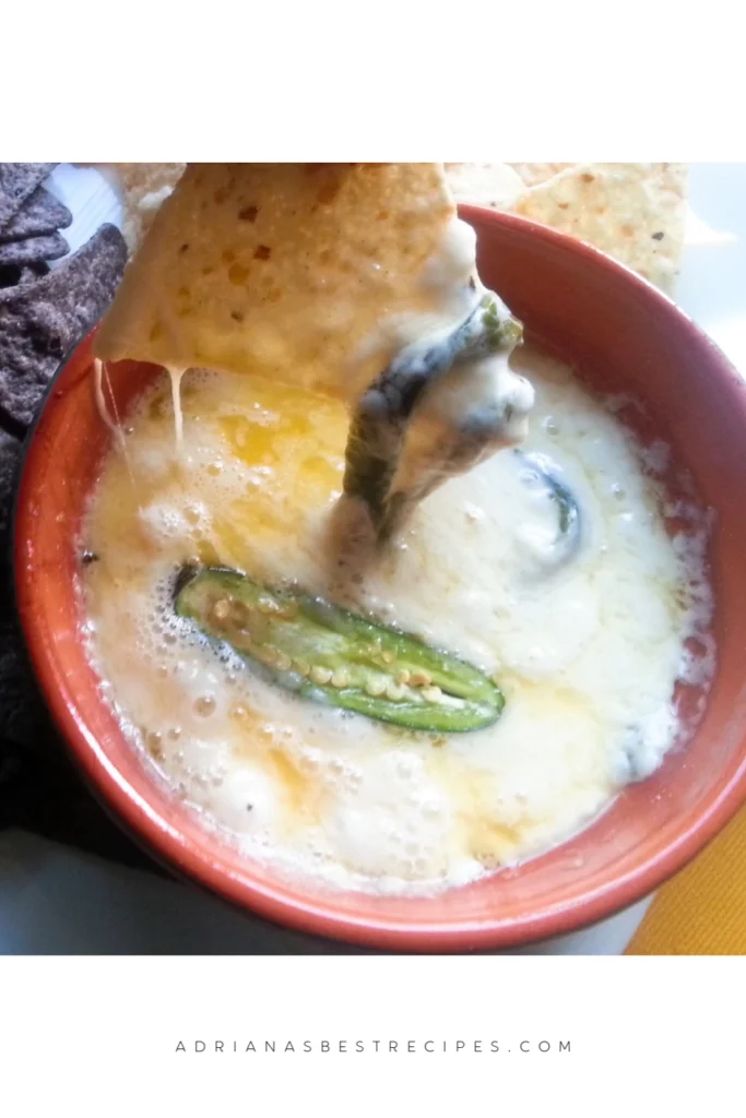 Nothing like melted queso with a spicy kick and corn chips