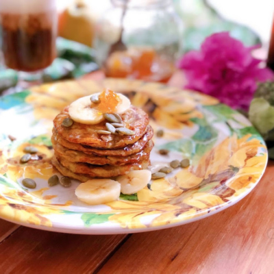 Flourless pancakes using banana, egg, and oats. Served with honey, pepitas, and honeycomb.